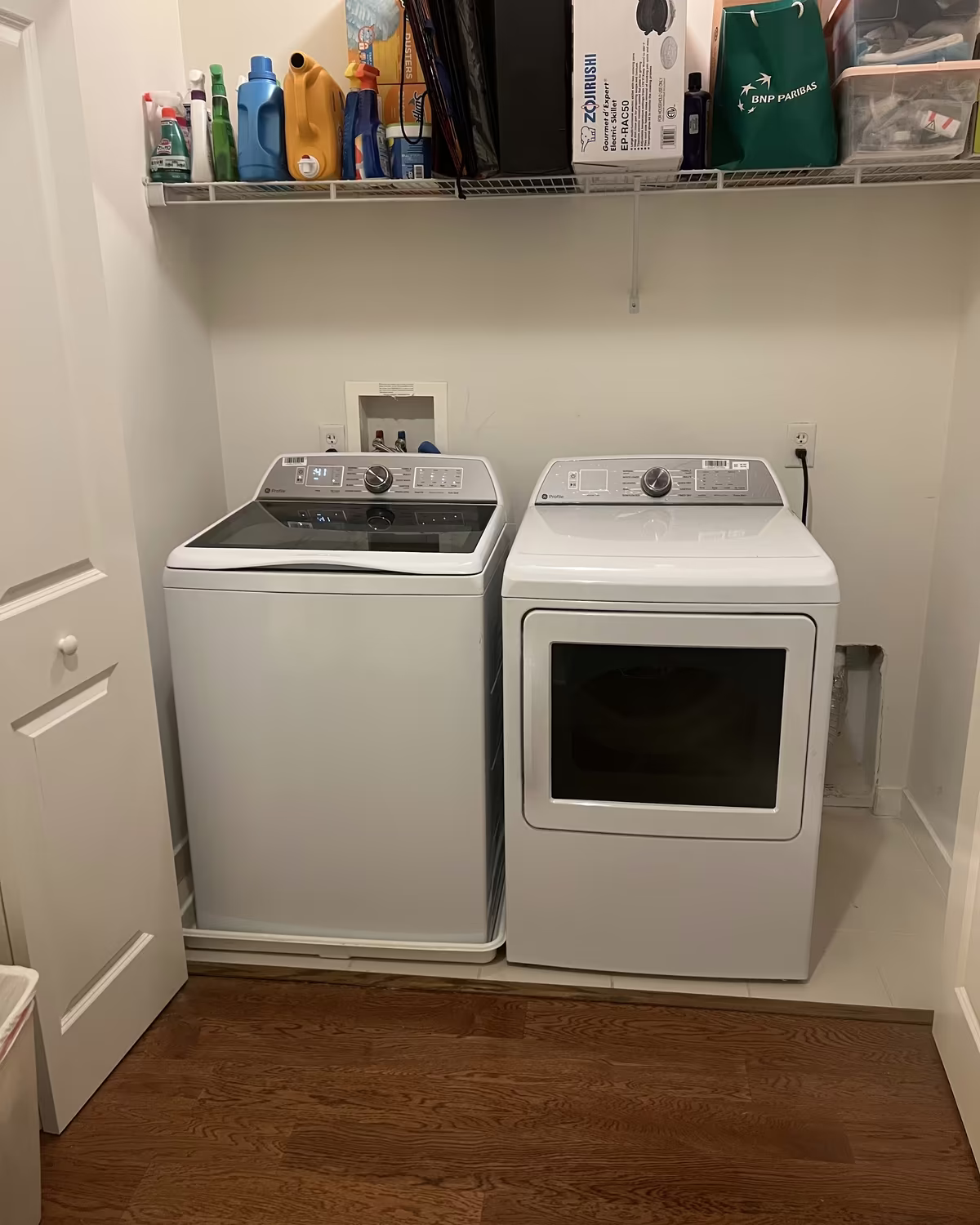 A washer and dryer from our floor, installed in a customer's laundry closet